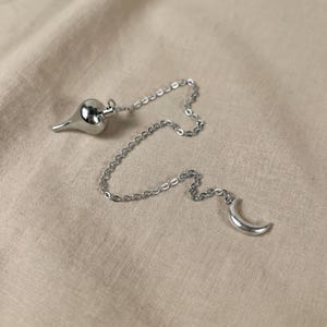 Péndulo metálico de radiestesia Luzi, herramienta de adivinación en forma de lágrima, luna creciente, geobiología