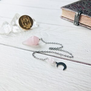 Rose quartz gemstone dowsing pendulum crescent moon and stainless steel witch divination tool