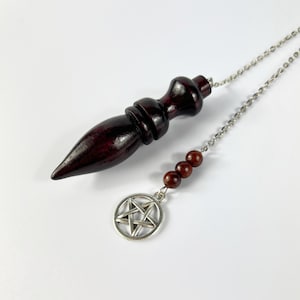 Coconut wood dowsing pendulum, divination tool with a pagan witch pentacle charm