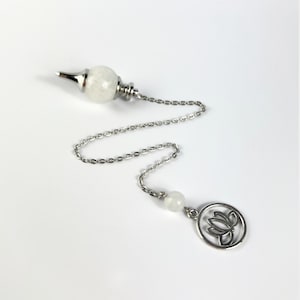 Clear quartz dowsing pendulum with a lotus charm Sephoroton gemstone pendulum divination tool