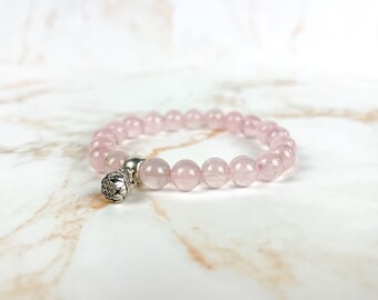 Rose quartz bracelet mala beaded bracelet with a lotus charm witch bracelet boho gemstone jewelry crystal bracelet