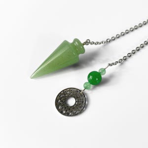 Dowsing pendulum, aventurine and mandala, spiritual divination tool