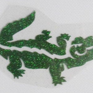 Op de afbeelding: Groene glitter alligator silhouet strijk-op patch.