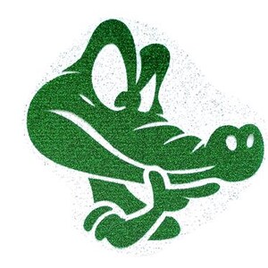 May include: Green glitter crocodile cartoon character with a wide open mouth and big eyes. The crocodile is looking to the right.