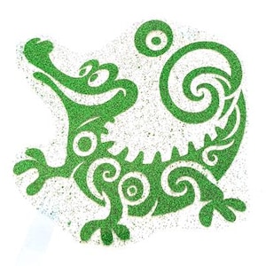 May include: Green glitter crocodile silhouette with a swirl pattern on a white background.