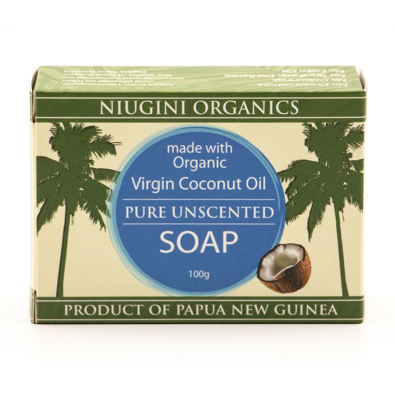 May include: A bar of Niugini Organics Pure Unscented Soap made with organic virgin coconut oil. The soap is packaged in a box with a green palm tree design and the text "Product of Papua New Guinea".