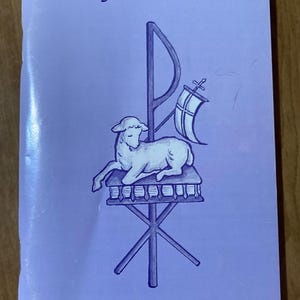 May include: A lavender booklet with the title "Making God the Joy of Our Soul" and an illustration of a lamb. The text "Abridged Version" is at the bottom of the booklet.