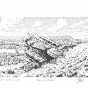 May include: A black and white pen and ink drawing of a large rock formation called "Hanging Rock". The rock is perched on a hillside with a view of a valley and distant hills. The drawing is signed by Trevor Yorke.