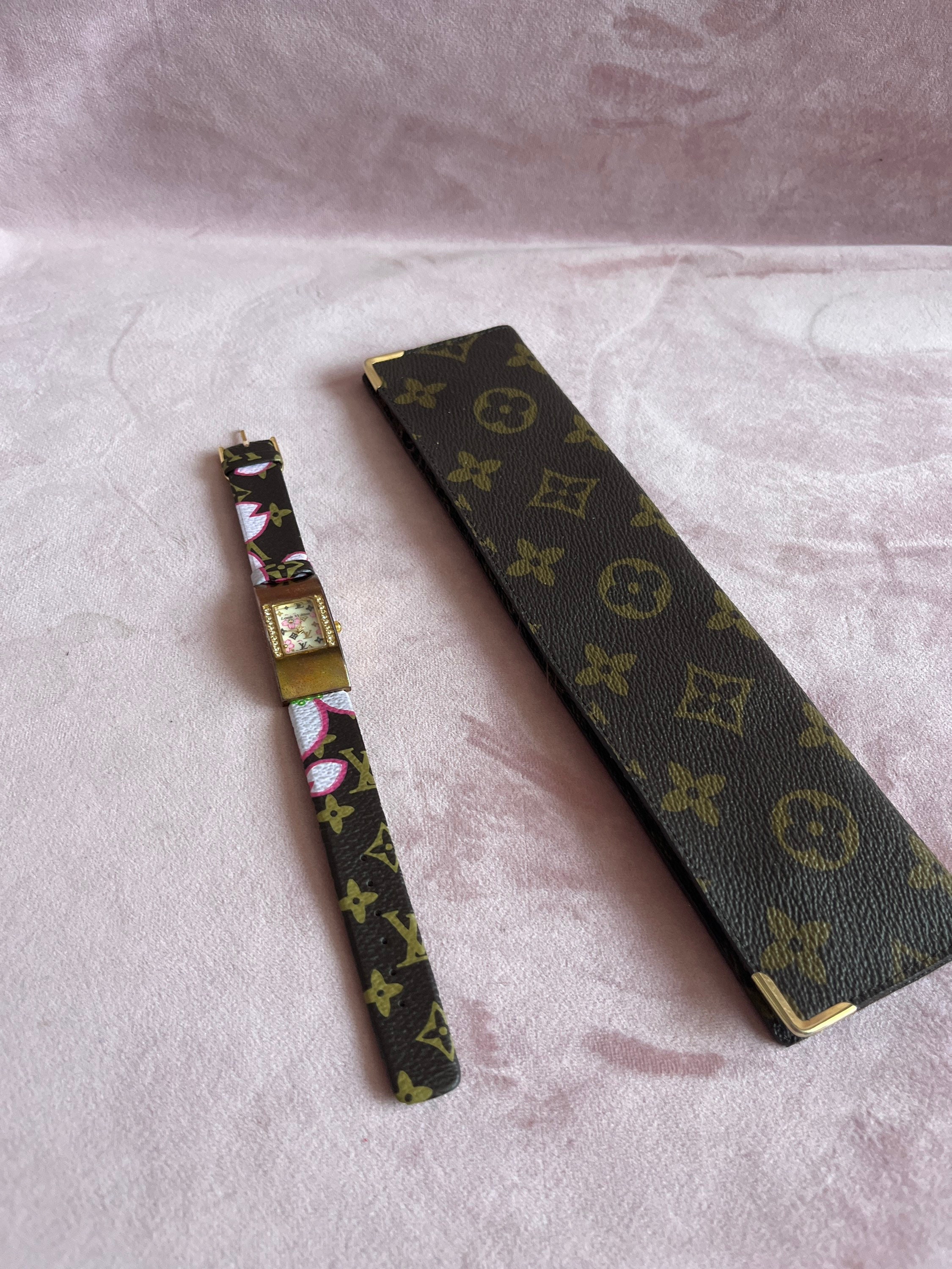 Vintage watch case with monogram pattern by Louis Vuitton, France