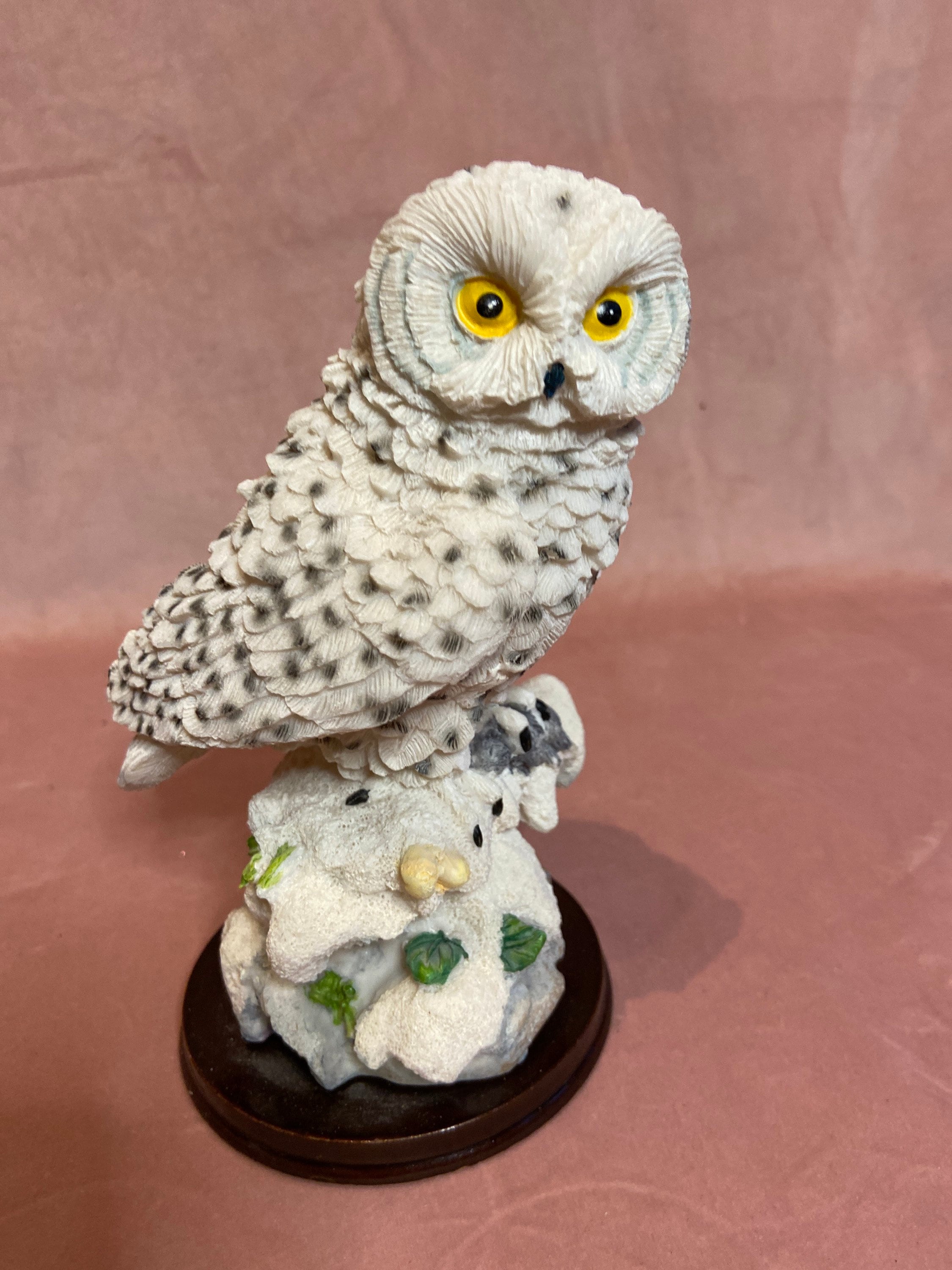 Vintage white on a wooden stand owl.Beautiful statuette.