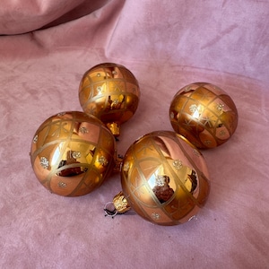 Vintage set of 4 gold glass engraved Christmas Baubles.