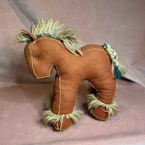 Vintage unique handmade fabric horse.Beautiful hand-sewn woolly play horse for children.