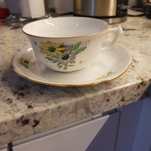 Vintage Cup and Saucer made in Czechoslovakia-Karlovy Vary. Beautiful yellow flowers ornaments.