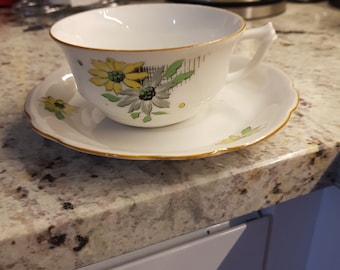 Vintage Cup and Saucer made in Czechoslovakia-Karlovy Vary. Beautiful yellow flowers ornaments.