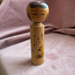Very cute vintage wooden Japanese Kokeshi Doll .