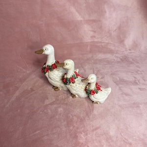 Beautiful Vintage 3 ceramic ducks with red roses.