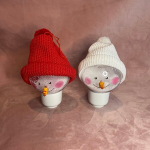 Christmas Bauble snowman with white or red hat.