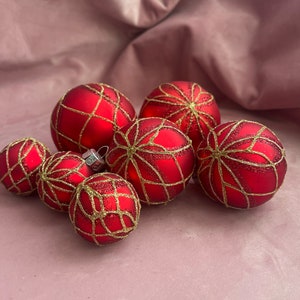 Unique Beautiful set of 7 red,gold glass Christmas Baubles.