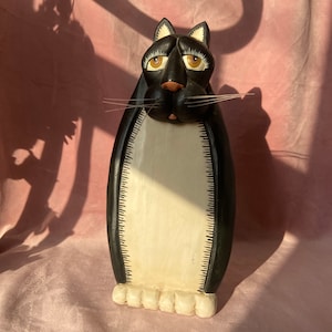 Vintage wooden cat door block.