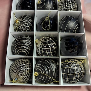 Beautiful set of 12 Christmas Baubles blue black and gold Color.