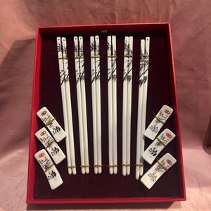 Vintage Asian  wooden  set of 6 sticks ,chop sticks.