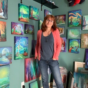 This is artist, Raines, studio. She loves creating original paintings with acrylic paint on canvas.  She has created her own whimsical, magic world through art. Her dream is to share art with people and pass on the joy she gets from painting it.