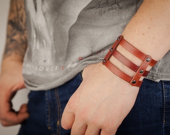 Wide leather bracelet, handmade, unique design, riveted, desaturated red brown leather