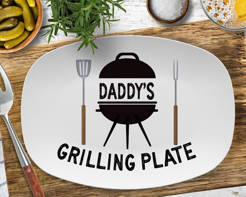 a white plate with a grilling plate on it