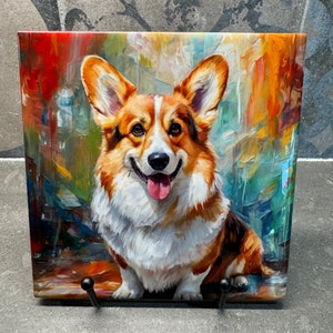 May include: A colorful painting of a corgi dog with brown and white fur. The dog is sitting on a colorful background with abstract brushstrokes.