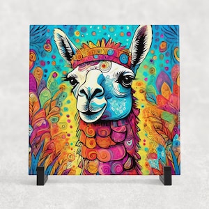 May include: A colourful, abstract illustration of a llama with a patterned headband. The background is a vibrant blue with yellow, orange, and green accents.