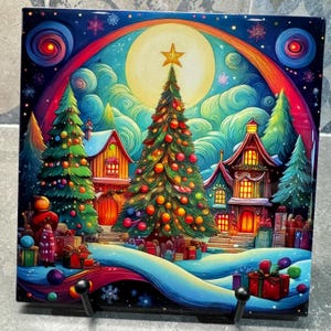 May include: A colorful Christmas scene with a large, decorated Christmas tree, two houses with lit windows, and a snowy landscape. The scene is set against a starry night sky with a full moon and a rainbow.