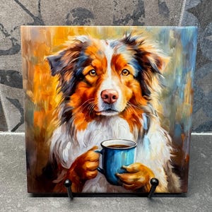 May include: A painting of an Australian Shepherd dog holding a blue mug with coffee. The dog has brown, white, and black fur. The background is a blurred orange and yellow.