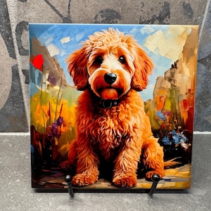 May include: Square tile featuring a painting of a golden-colored dog with a black collar, set against a colorful landscape of blue sky, mountains, and flowers. The dog is the central focus.