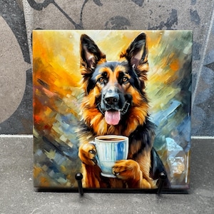 May include: A painting of a German Shepherd dog holding a blue and white coffee mug. The dog has a brown and black coat and is looking directly at the viewer. The background is a colourful abstract design.