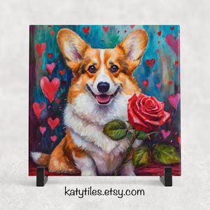 Puede incluir: Una pintura colorida de un perro corgi con una rosa roja en la boca. El fondo es un diseño abstracto azul y morado con corazones.