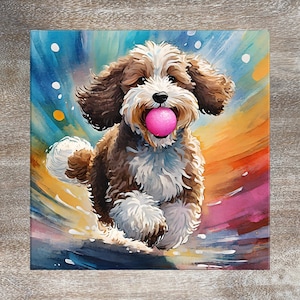 May include: A brown and white dog with a pink ball in its mouth runs through a colorful abstract background. The dog is in focus and the background is blurred.