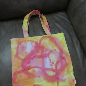 Red, pink, orange and yellow tye dye canvas bag