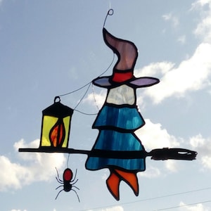 Spider and witch on her flying broom in tinted glasses. Tiffany stained glass Halloween sun catcher sculpture image 1