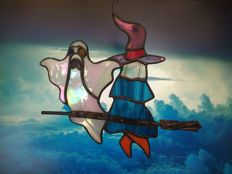 Ghost and witch on her broom in tinted glasses Halloween suncatcher sculpture assembled using the Tiffany stained glass technique image 1