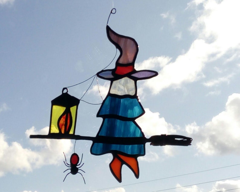 Spider and witch on her flying broom in tinted glasses. Tiffany stained glass Halloween sun catcher sculpture image 1