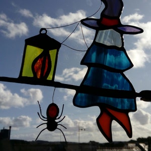 Spider and witch on her flying broom in tinted glasses. Tiffany stained glass Halloween sun catcher sculpture image 4