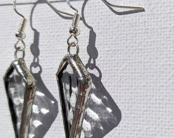 Earrings geometric art, transparent glass bubble effect with a sparkling reflection.