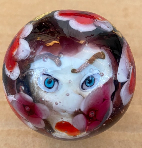 Handmade artisan glass collector's marble head Lexy with 23KT gold foil accents.