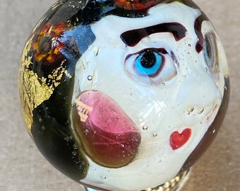 Handmade artisan glass collector's marble head Jesse with 23KT gold foil accents.