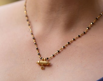 Gold tulsi chain discount