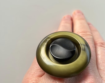 Sascha, unique ring made of two discarded old buttons.