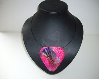 Carry a piece of art with you: unique necklace made of handmade paper.