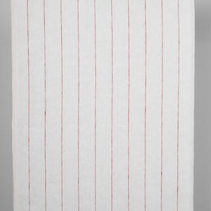 May include: White fabric with thin red vertical stripes. The fabric has a slightly textured surface.