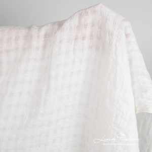 Off-white linen fabric in transparent checks, washed | Pure Linen | Width 145cm ± 5% | Weight ± 150g / m2 | Made by Siulas, Lithuania