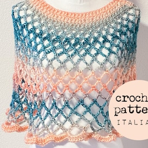 May include: A crochet shawl with a delicate, openwork design in shades of peach, teal, and gray. The shawl is made with a simple stitch pattern and has a scalloped edge. The text "crochet pattern ITALIANO" is visible in the lower right corner of the image.